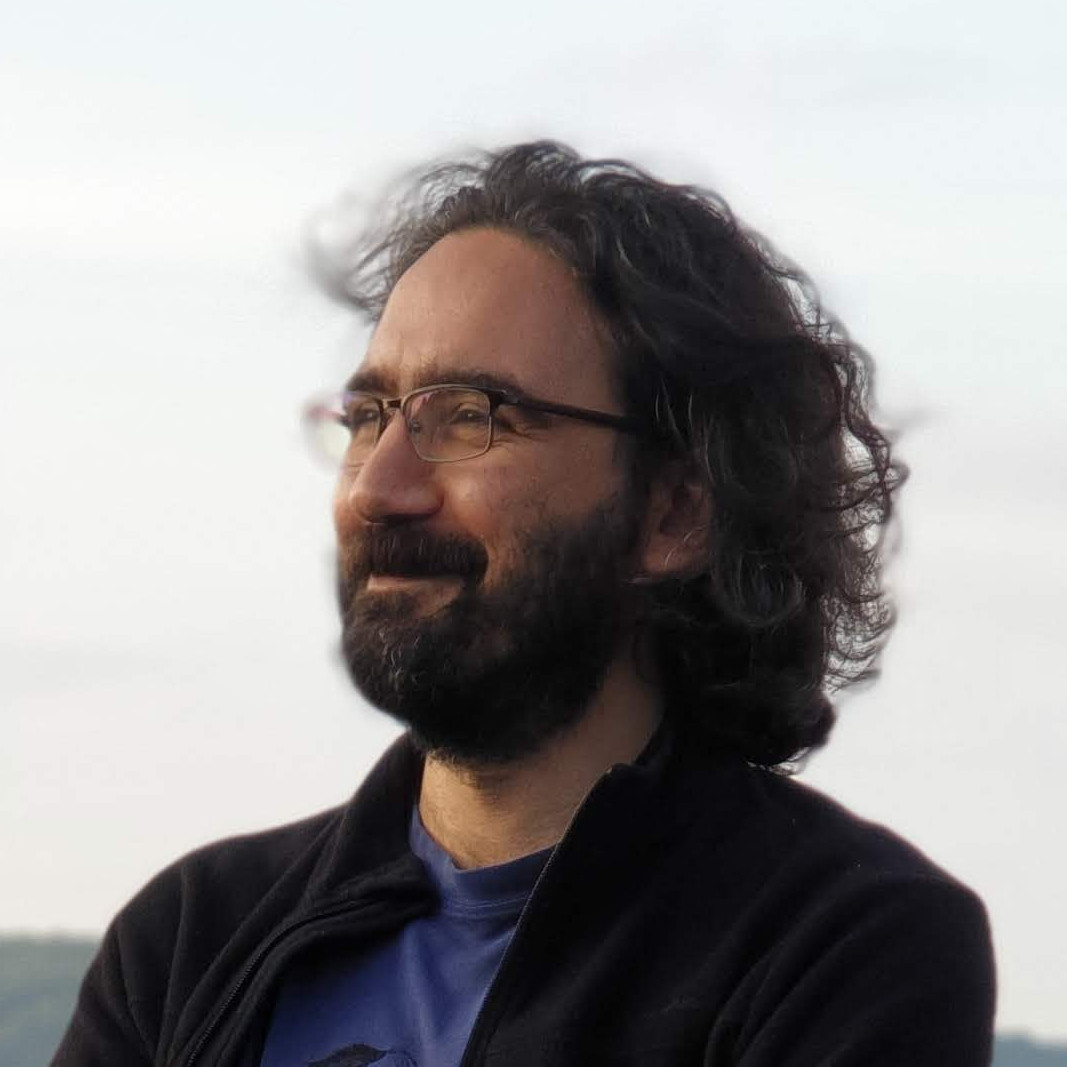 Onur Güngör looking to the side